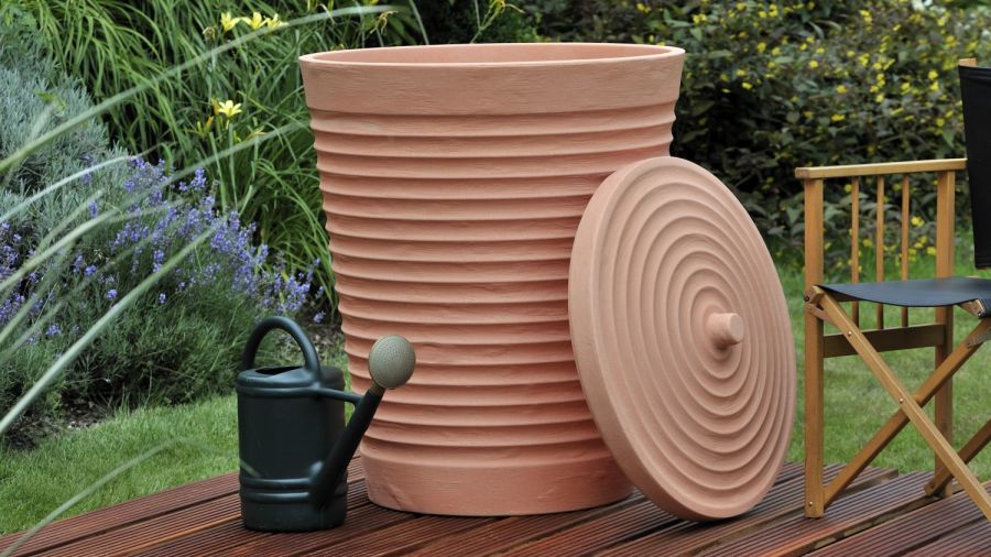 9000700K Tuscan Terracotta 275l water butt for dunking watering cans.